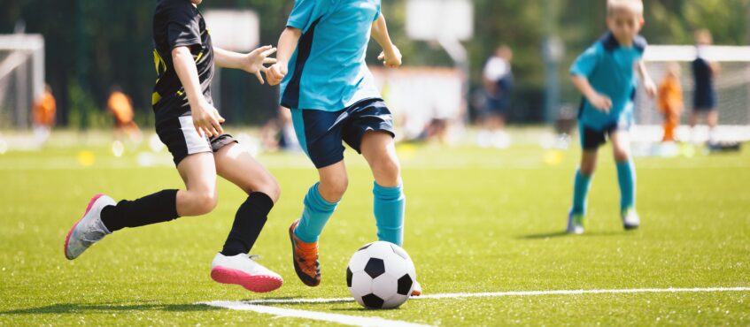 People-first Microsoft Teams enablement visualized through a soccer team working together on the field